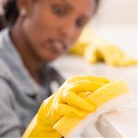 Person cleaning counter