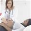 Pregnant woman at check up with female doctor