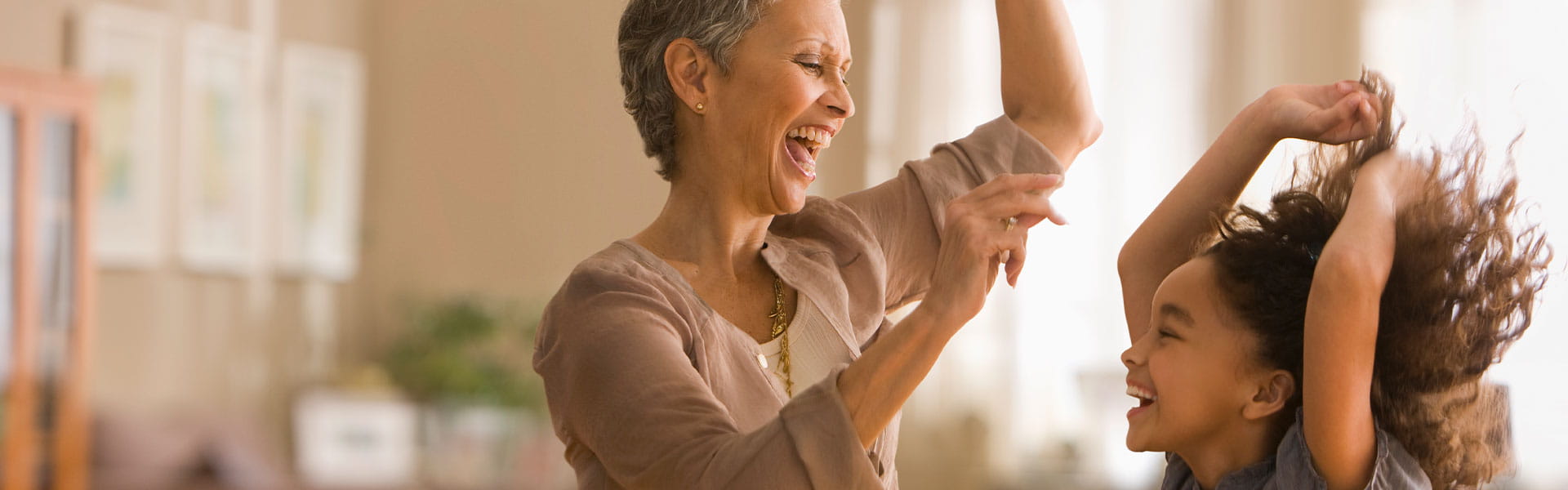 woman and girl dancing