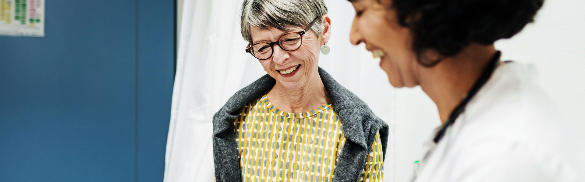 women talking to her doctor